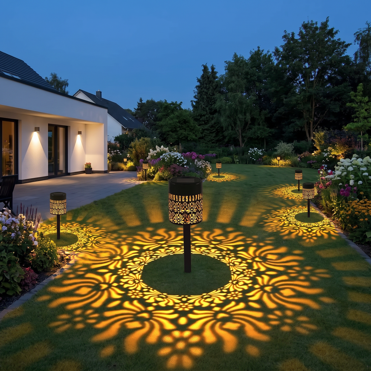 Back garden at dusk with peony mandala lights
