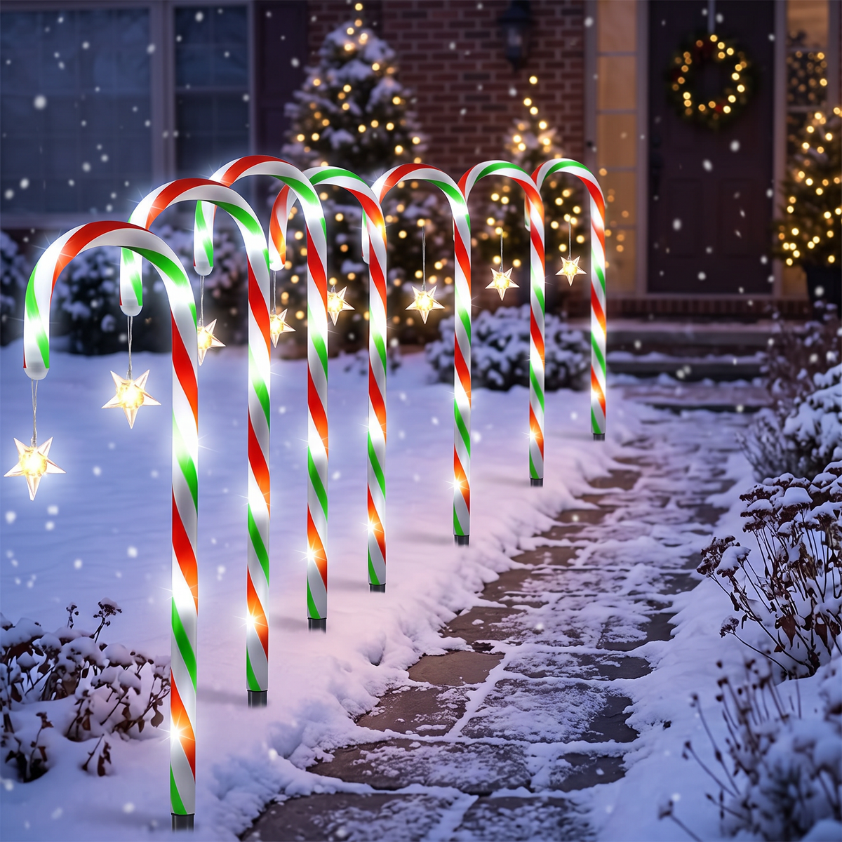 Full set of five candy cane lights on a snowy path