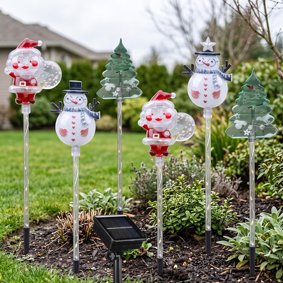Christmas spike lights in a garden in daylight