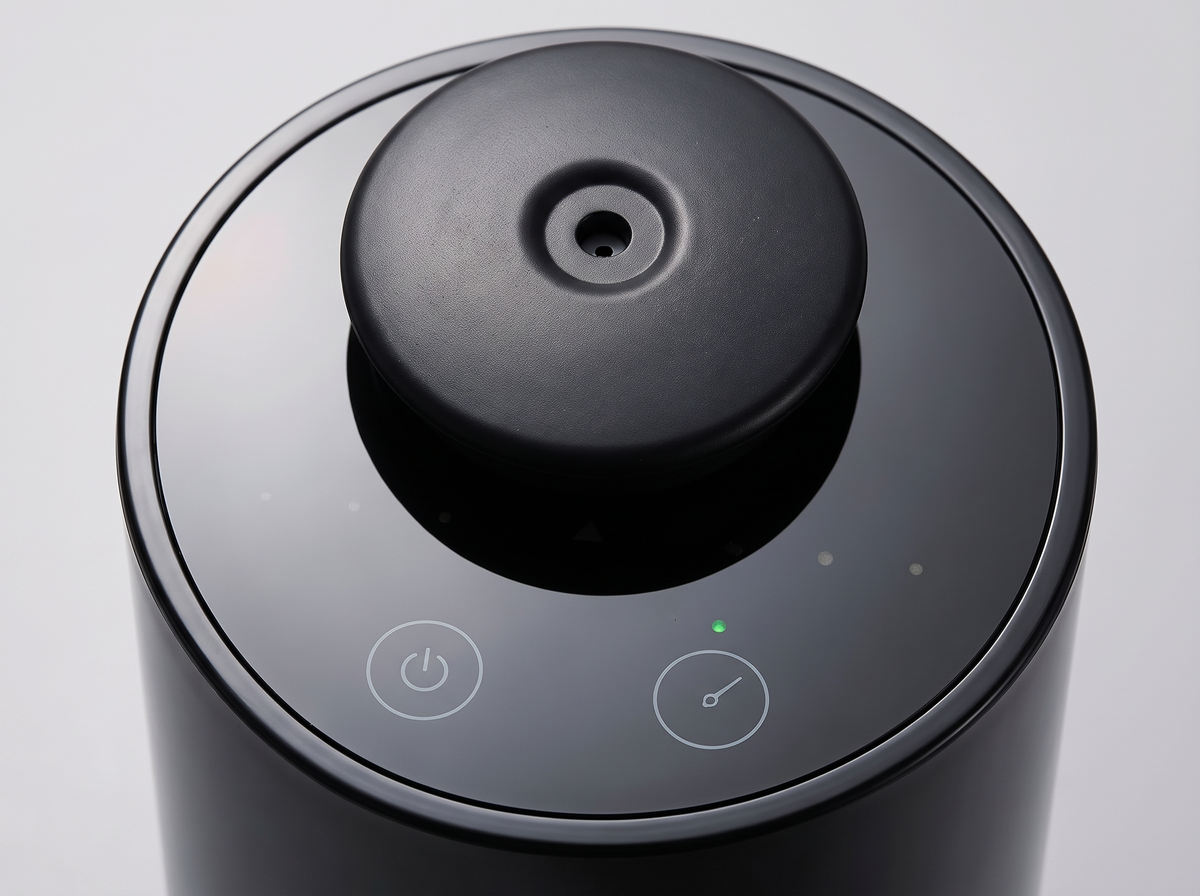 Close-up of diffuser power and mist level controls